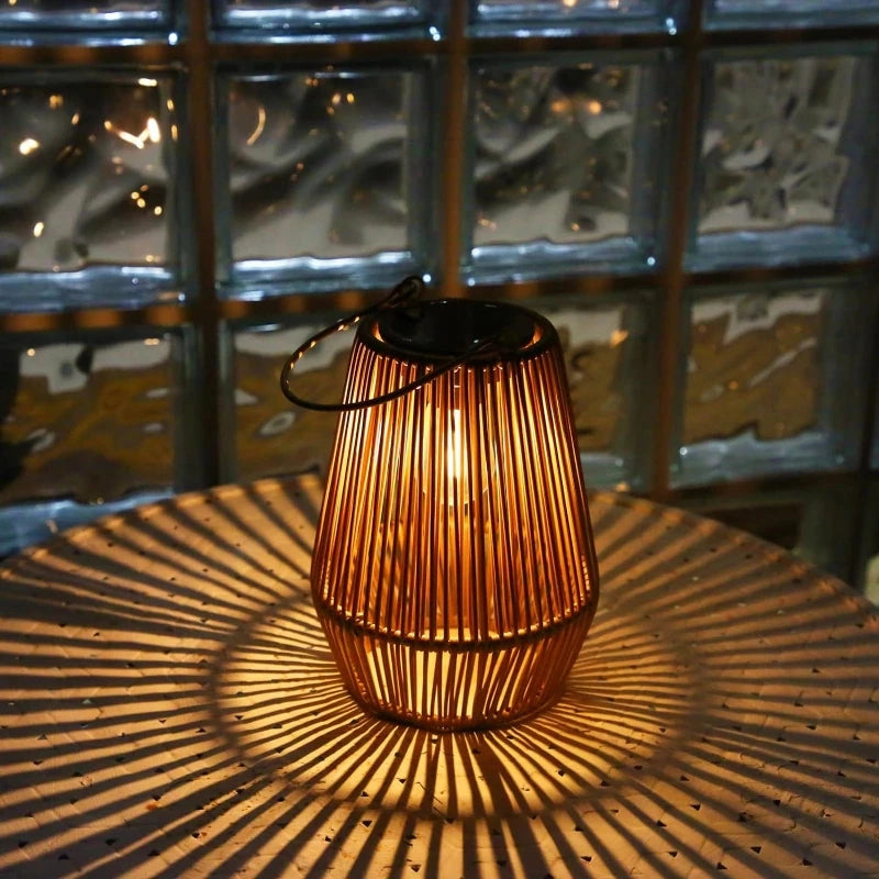 Solar lantern casting beautiful shadows on tabletop at dusk